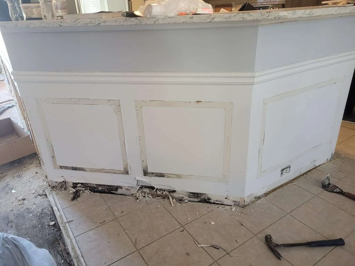 Water damage and mold on kitchen during Storm Damage Restoration in Pittsford